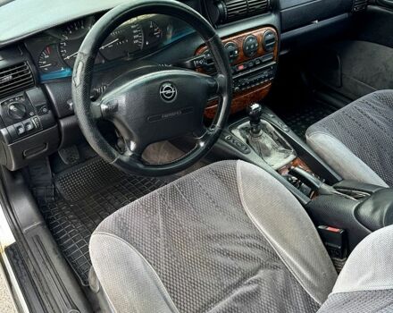 Сірий Опель Омега, об'ємом двигуна 2 л та пробігом 300 тис. км за 1400 $, фото 8 на Automoto.ua