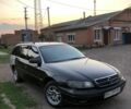 Сірий Опель Омега, об'ємом двигуна 2.5 л та пробігом 300 тис. км за 1498 $, фото 1 на Automoto.ua