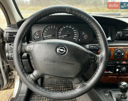 Сірий Опель Омега, об'ємом двигуна 2 л та пробігом 375 тис. км за 1900 $, фото 17 на Automoto.ua