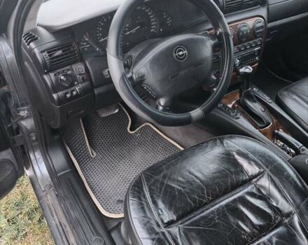 Опель Омега 1998 в Черкассах на Automoto.ua Серый Опель Омега, объемом двигателя 2.5 л и пробегом 282 тыс. км за 3500 $, фото 11 на Automoto.ua