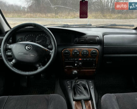 Сірий Опель Омега, об'ємом двигуна 2 л та пробігом 375 тис. км за 1900 $, фото 16 на Automoto.ua