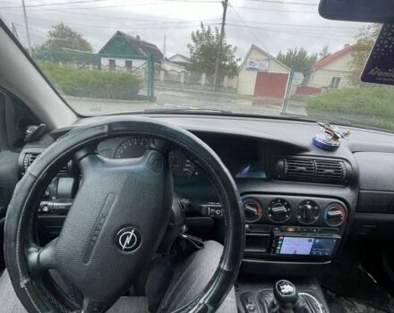 Серый Опель Омега, объемом двигателя 2 л и пробегом 263 тыс. км за 2450 $, фото 1 на Automoto.ua