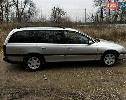 Сірий Опель Омега, об'ємом двигуна 2 л та пробігом 375 тис. км за 1900 $, фото 3 на Automoto.ua