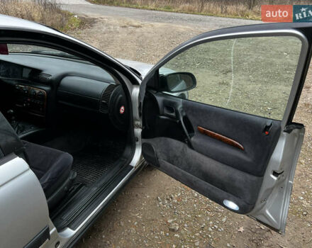 Сірий Опель Омега, об'ємом двигуна 2 л та пробігом 375 тис. км за 1900 $, фото 12 на Automoto.ua