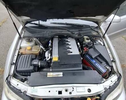 Серый Опель Омега, объемом двигателя 2.5 л и пробегом 310 тыс. км за 3200 $, фото 1 на Automoto.ua