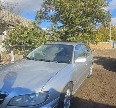 Серый Опель Омега, объемом двигателя 2.5 л и пробегом 330 тыс. км за 3500 $, фото 12 на Automoto.ua