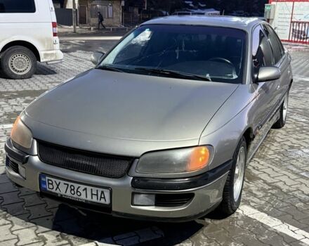 Серый Опель Омега, объемом двигателя 3 л и пробегом 253 тыс. км за 1900 $, фото 1 на Automoto.ua