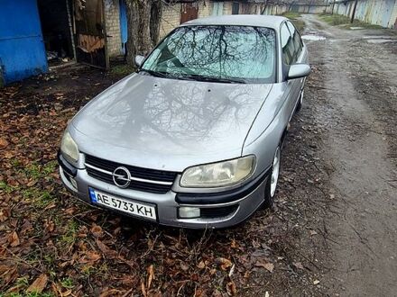 Сірий Опель Омега, об'ємом двигуна 2 л та пробігом 250 тис. км за 1300 $, фото 1 на Automoto.ua
