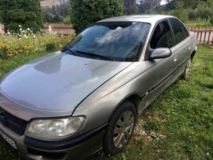 Серый Опель Омега, объемом двигателя 2.5 л и пробегом 257 тыс. км за 1650 $, фото 1 на Automoto.ua