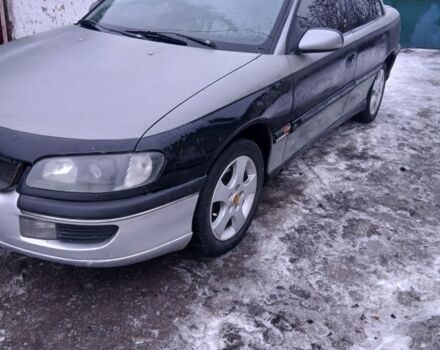 Серый Опель Омега, объемом двигателя 2 л и пробегом 100 тыс. км за 1250 $, фото 1 на Automoto.ua