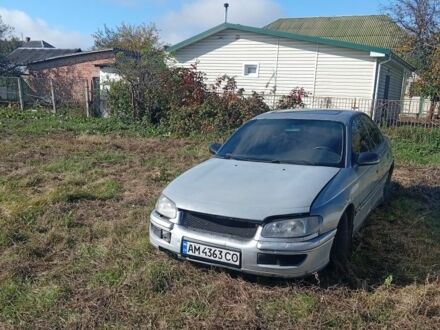 Сірий Опель Омега, об'ємом двигуна 2 л та пробігом 300 тис. км за 801 $, фото 1 на Automoto.ua