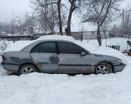 Серый Опель Омега, объемом двигателя 2 л и пробегом 300 тыс. км за 750 $, фото 1 на Automoto.ua