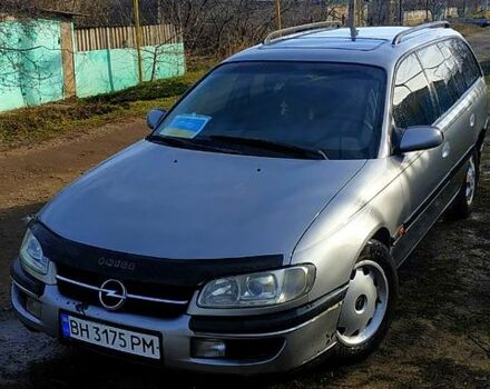 Серый Опель Омега, объемом двигателя 2 л и пробегом 295 тыс. км за 2400 $, фото 1 на Automoto.ua