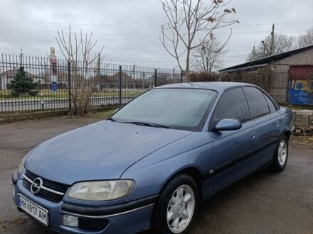 Сірий Опель Омега, об'ємом двигуна 2 л та пробігом 409 тис. км за 2200 $, фото 1 на Automoto.ua