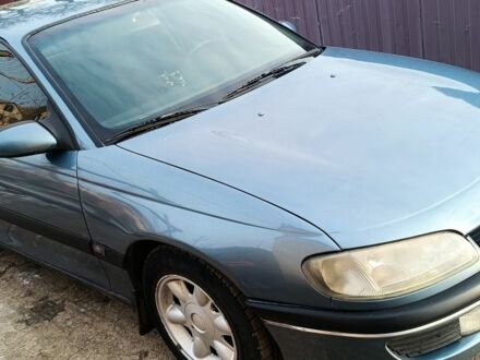 Серый Опель Омега, объемом двигателя 2 л и пробегом 490 тыс. км за 2086 $, фото 1 на Automoto.ua