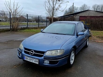Серый Опель Омега, объемом двигателя 2 л и пробегом 325 тыс. км за 2200 $, фото 1 на Automoto.ua