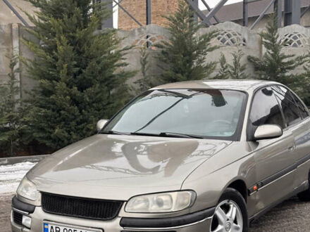 Серый Опель Омега, объемом двигателя 2 л и пробегом 300 тыс. км за 2500 $, фото 1 на Automoto.ua