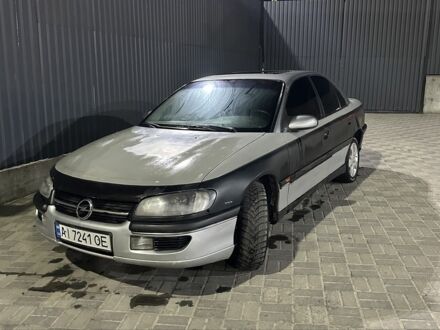 Сірий Опель Омега, об'ємом двигуна 2 л та пробігом 250 тис. км за 1200 $, фото 1 на Automoto.ua