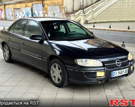 Серый Опель Омега, объемом двигателя 2.5 л и пробегом 270 тыс. км за 1600 $, фото 1 на Automoto.ua