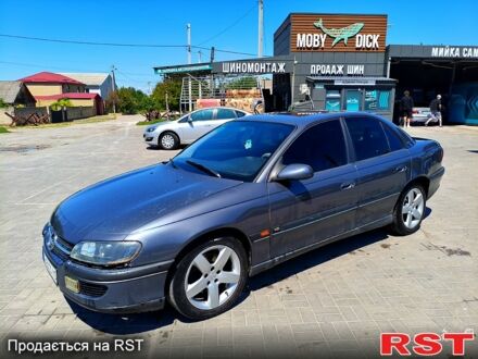 Серый Опель Омега, объемом двигателя 2.5 л и пробегом 446 тыс. км за 2800 $, фото 1 на Automoto.ua