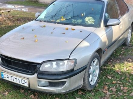 Серый Опель Омега, объемом двигателя 2.5 л и пробегом 180 тыс. км за 2200 $, фото 1 на Automoto.ua