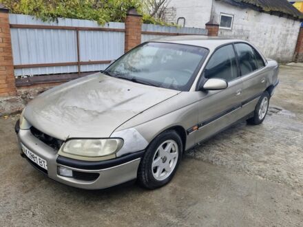 Серый Опель Омега, объемом двигателя 2.5 л и пробегом 321 тыс. км за 1100 $, фото 1 на Automoto.ua