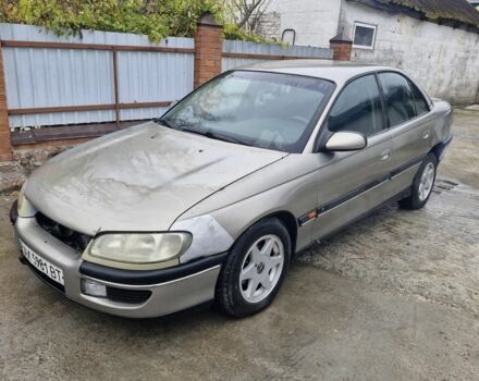 Серый Опель Омега, объемом двигателя 2.5 л и пробегом 321 тыс. км за 1100 $, фото 1 на Automoto.ua