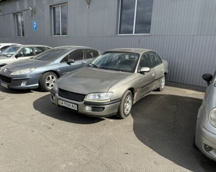 Серый Опель Омега, объемом двигателя 2 л и пробегом 300 тыс. км за 1550 $, фото 1 на Automoto.ua