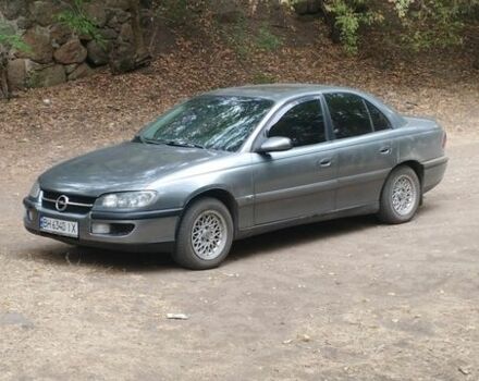 Серый Опель Омега, объемом двигателя 2 л и пробегом 350 тыс. км за 2300 $, фото 1 на Automoto.ua
