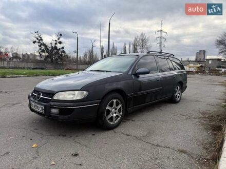 Сірий Опель Омега, об'ємом двигуна 2 л та пробігом 247 тис. км за 2200 $, фото 1 на Automoto.ua