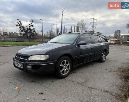 Серый Опель Омега, объемом двигателя 2 л и пробегом 247 тыс. км за 2200 $, фото 1 на Automoto.ua