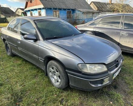 Серый Опель Омега, объемом двигателя 2.5 л и пробегом 300 тыс. км за 400 $, фото 1 на Automoto.ua