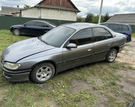 Серый Опель Омега, объемом двигателя 2.5 л и пробегом 300 тыс. км за 870 $, фото 1 на Automoto.ua