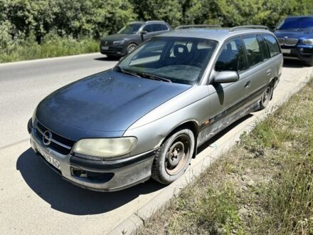 Сірий Опель Омега, об'ємом двигуна 2 л та пробігом 300 тис. км за 799 $, фото 1 на Automoto.ua