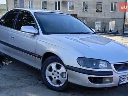 Серый Опель Омега, объемом двигателя 2.5 л и пробегом 377 тыс. км за 2200 $, фото 1 на Automoto.ua