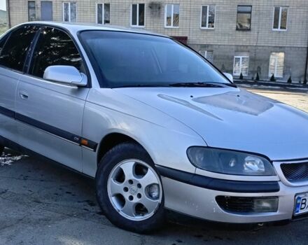 Серый Опель Омега, объемом двигателя 2.5 л и пробегом 377 тыс. км за 2200 $, фото 1 на Automoto.ua