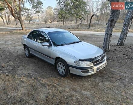 Серый Опель Омега, объемом двигателя 2 л и пробегом 249 тыс. км за 2450 $, фото 1 на Automoto.ua