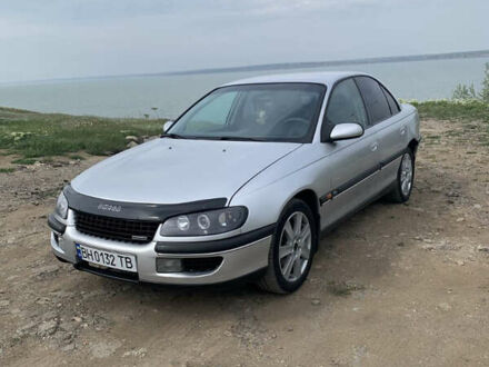 Серый Опель Омега, объемом двигателя 2.5 л и пробегом 383 тыс. км за 3199 $, фото 1 на Automoto.ua