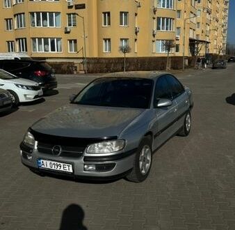 Серый Опель Омега, объемом двигателя 2.5 л и пробегом 230 тыс. км за 2700 $, фото 1 на Automoto.ua