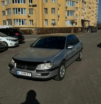 Серый Опель Омега, объемом двигателя 2.5 л и пробегом 230 тыс. км за 2700 $, фото 1 на Automoto.ua