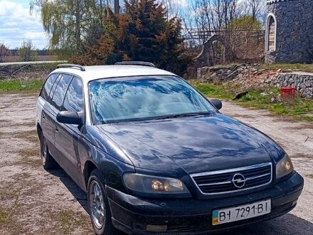 Сірий Опель Омега, об'ємом двигуна 2.5 л та пробігом 300 тис. км за 1600 $, фото 1 на Automoto.ua