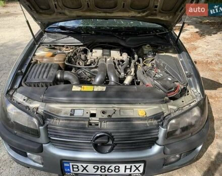 Серый Опель Омега, объемом двигателя 2.5 л и пробегом 287 тыс. км за 1900 $, фото 1 на Automoto.ua