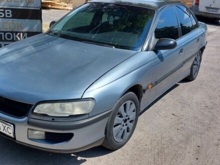 Серый Опель Омега, объемом двигателя 3 л и пробегом 350 тыс. км за 2000 $, фото 1 на Automoto.ua