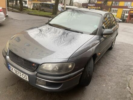 Серый Опель Омега, объемом двигателя 2.5 л и пробегом 283 тыс. км за 1300 $, фото 1 на Automoto.ua