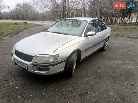 Серый Опель Омега, объемом двигателя 2.5 л и пробегом 398 тыс. км за 2400 $, фото 1 на Automoto.ua