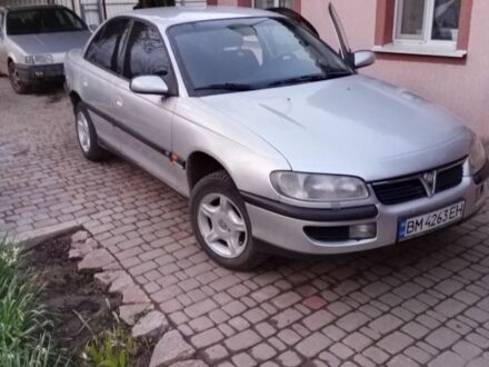 Сірий Опель Омега, об'ємом двигуна 2 л та пробігом 313 тис. км за 1800 $, фото 1 на Automoto.ua