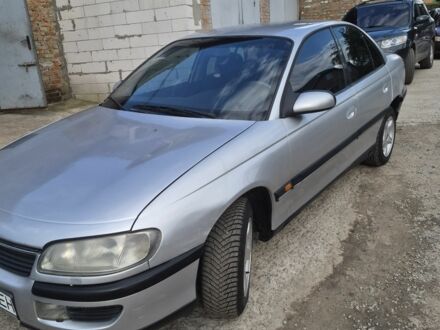 Сірий Опель Омега, об'ємом двигуна 2 л та пробігом 220 тис. км за 1900 $, фото 1 на Automoto.ua