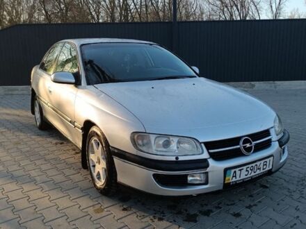Серый Опель Омега, объемом двигателя 2 л и пробегом 300 тыс. км за 2200 $, фото 1 на Automoto.ua