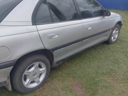 Серый Опель Омега, объемом двигателя 2 л и пробегом 243 тыс. км за 1200 $, фото 1 на Automoto.ua