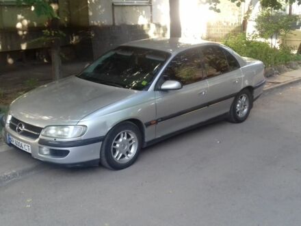 Сірий Опель Омега, об'ємом двигуна 2 л та пробігом 390 тис. км за 2999 $, фото 1 на Automoto.ua